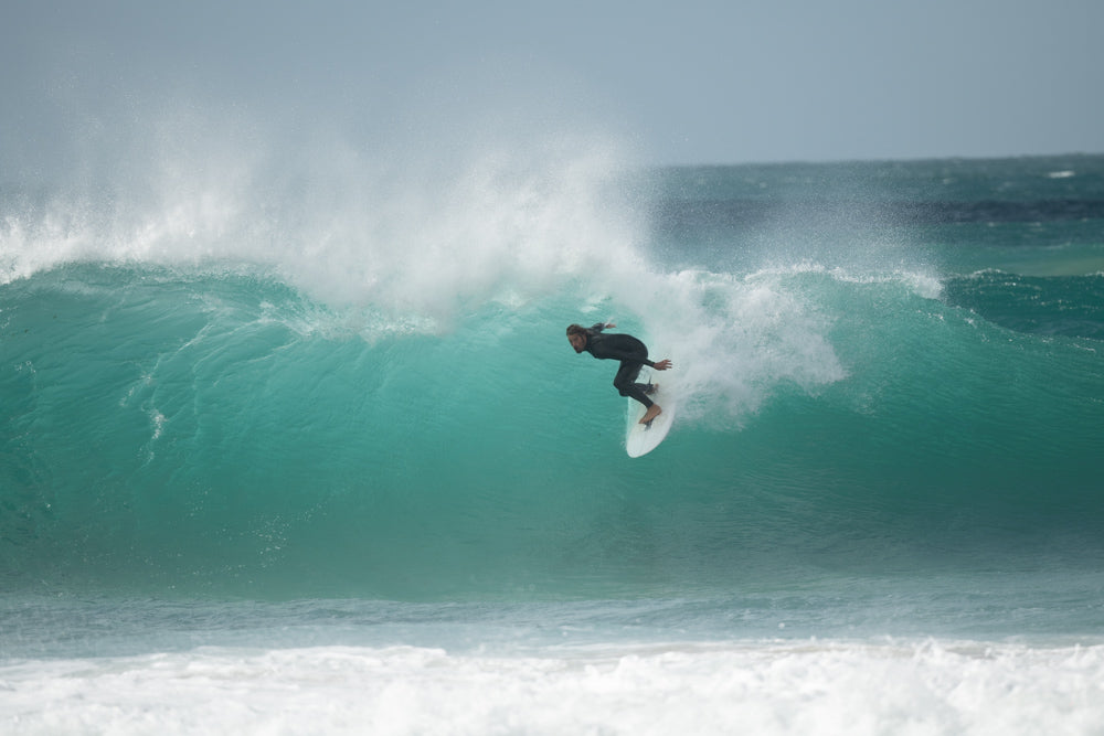 Dave Rastovich sampling the pristine waters of King Island, now being eyed off by the offshore gas industry. Photo Ted Grambeau