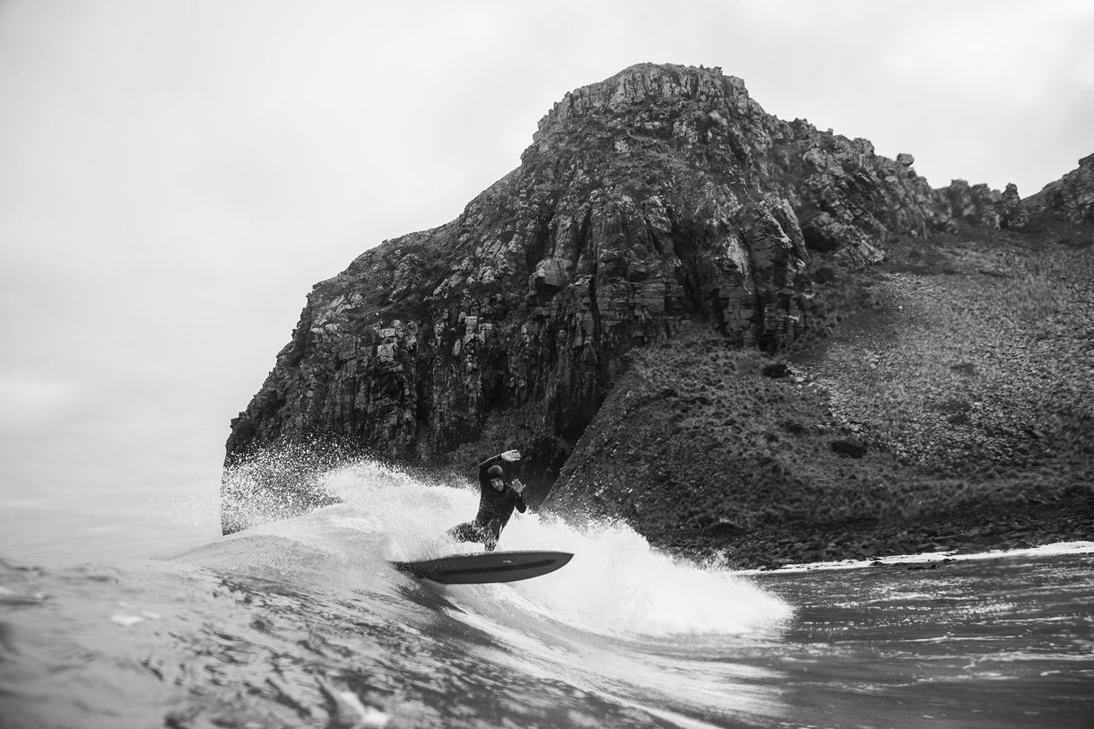 Opening image: “I wanted to showcase the magic of Tasmania in particular.” Kyron Rathbone displaces a few molecules of deep south ocean. Photo Nick Green